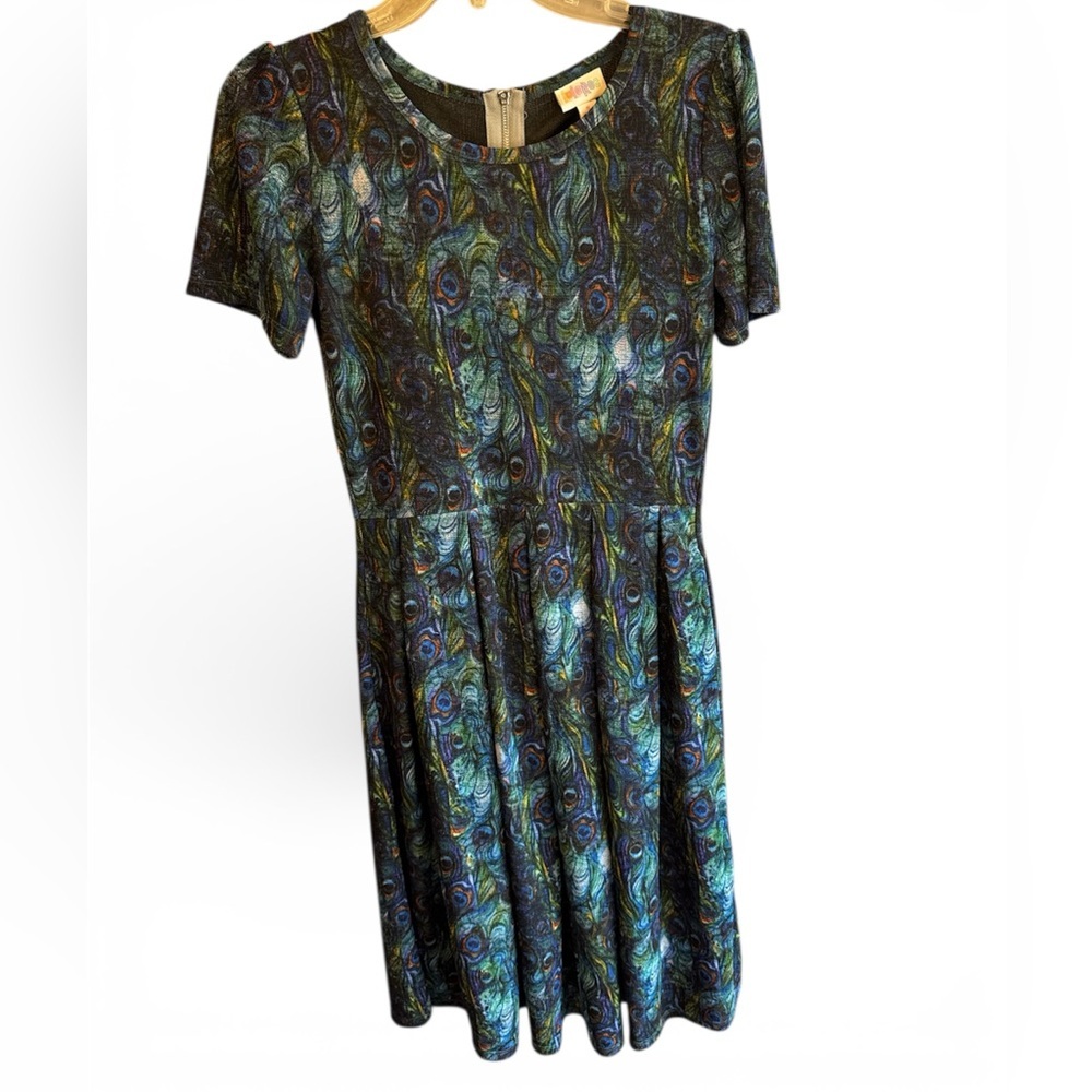 LuLaRoe Amelia dress featuring a peacock feathers pattern